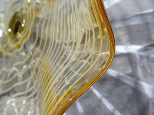 Wandteller in amber/ FOGLIA di Vetro