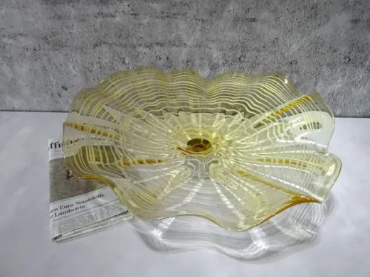 Wandteller in amber/ FOGLIA di Vetro