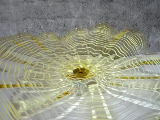 Wandteller in amber/ FOGLIA di Vetro