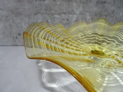 Wandteller in amber/ FOGLIA di Vetro