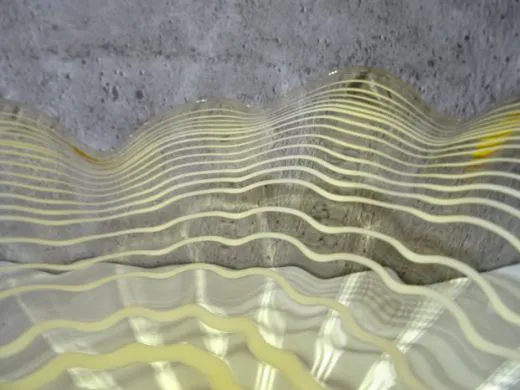 Wandteller in amber/ FOGLIA di Vetro