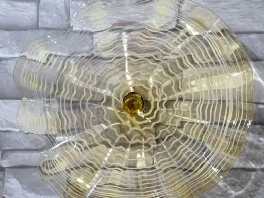 Wandteller in amber/ FOGLIA di Vetro