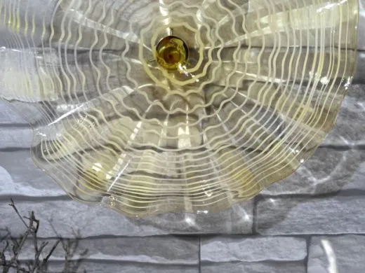 Wandteller in amber/ FOGLIA di Vetro