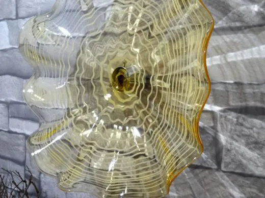 Wandteller in amber/ FOGLIA di Vetro
