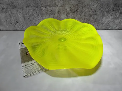 Wandteller in gelb/ FOGLIA di Vetro