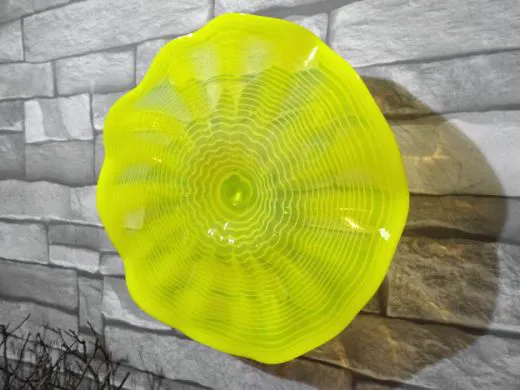 Wandteller in gelb/ FOGLIA di Vetro