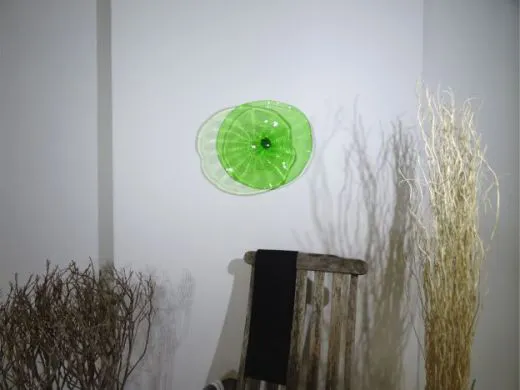 Wandteller in grün/ FOGLIA di Vetro